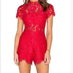 Alexis sexy and stylish red romper. Worn ONCE!